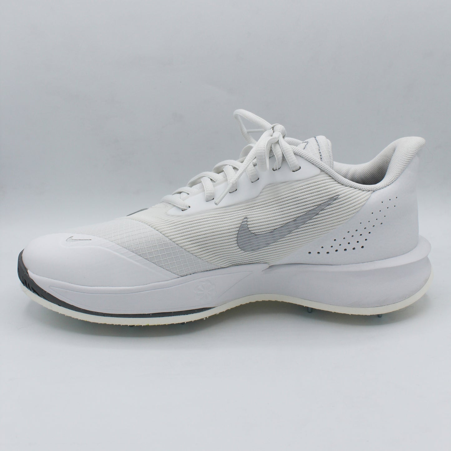 Pre-spiked Nike Precision 7