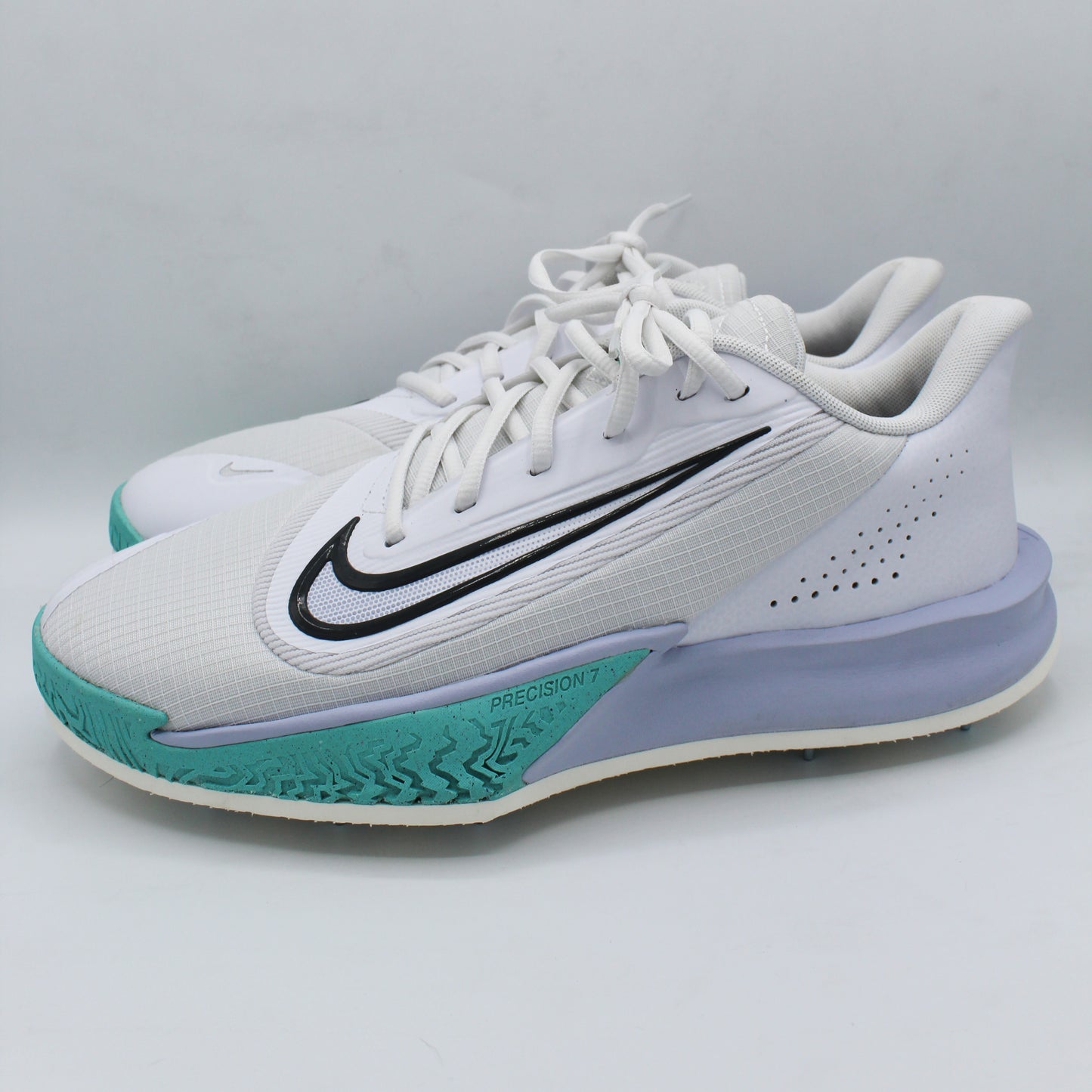 Pre-spiked Nike Precision 7