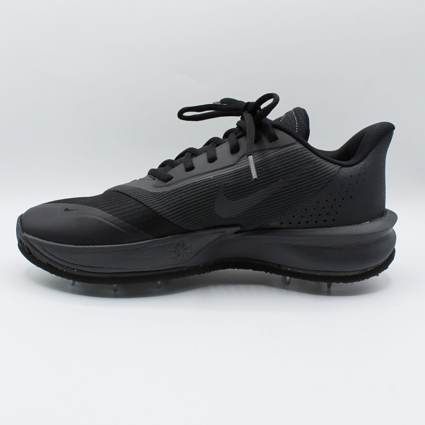 Pre-spiked Nike Precision 7