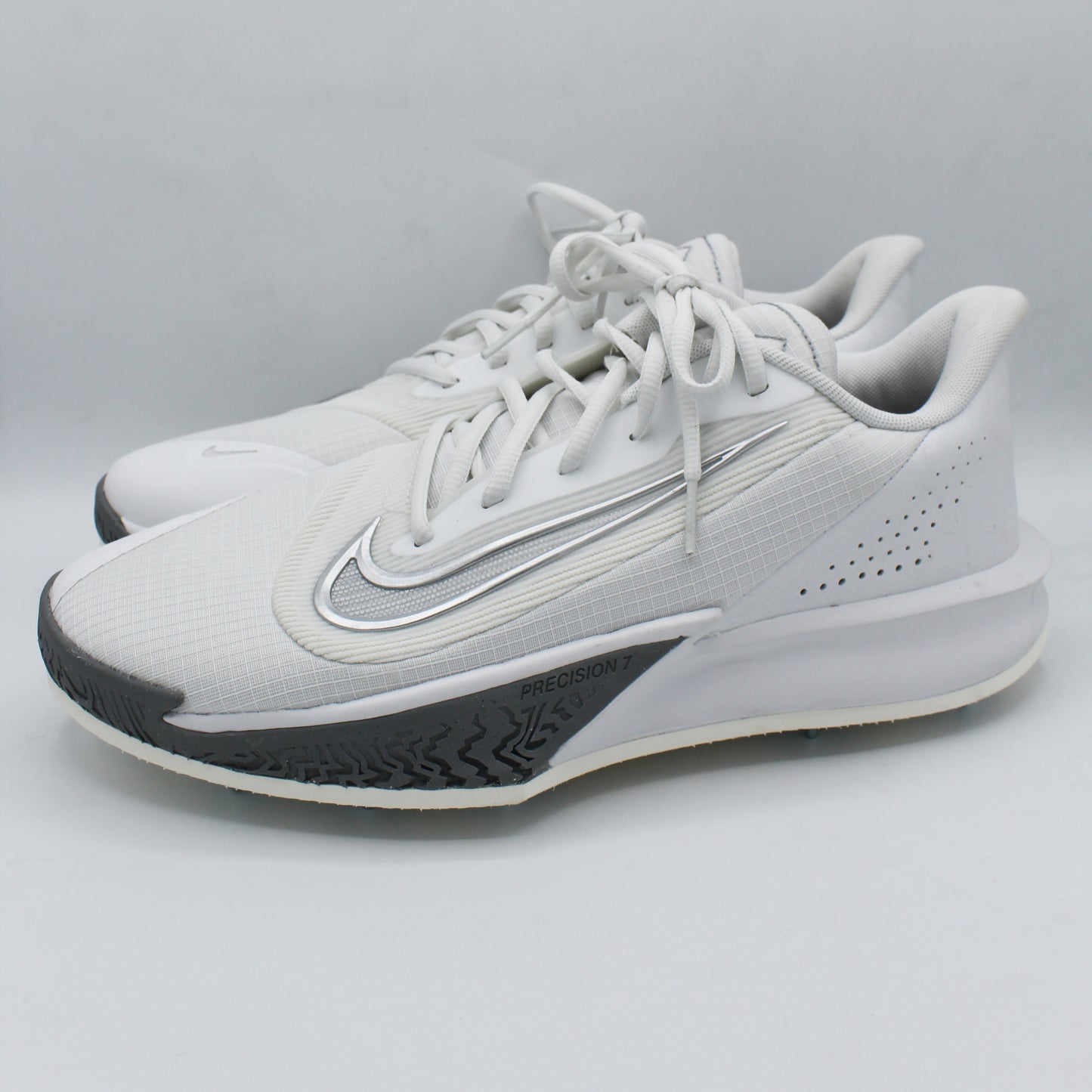 Pre-spiked Nike Precision 7