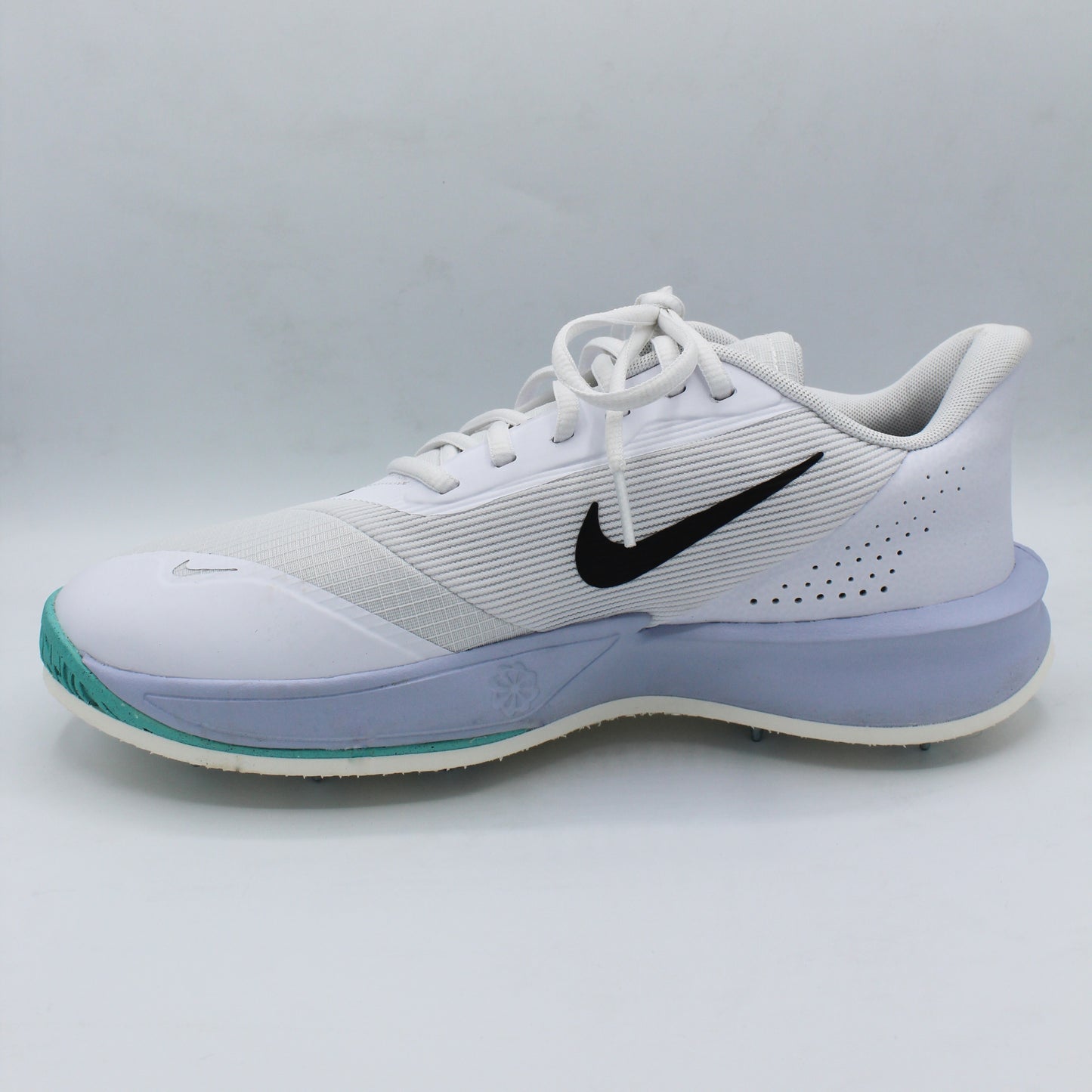 Pre-spiked Nike Precision 7