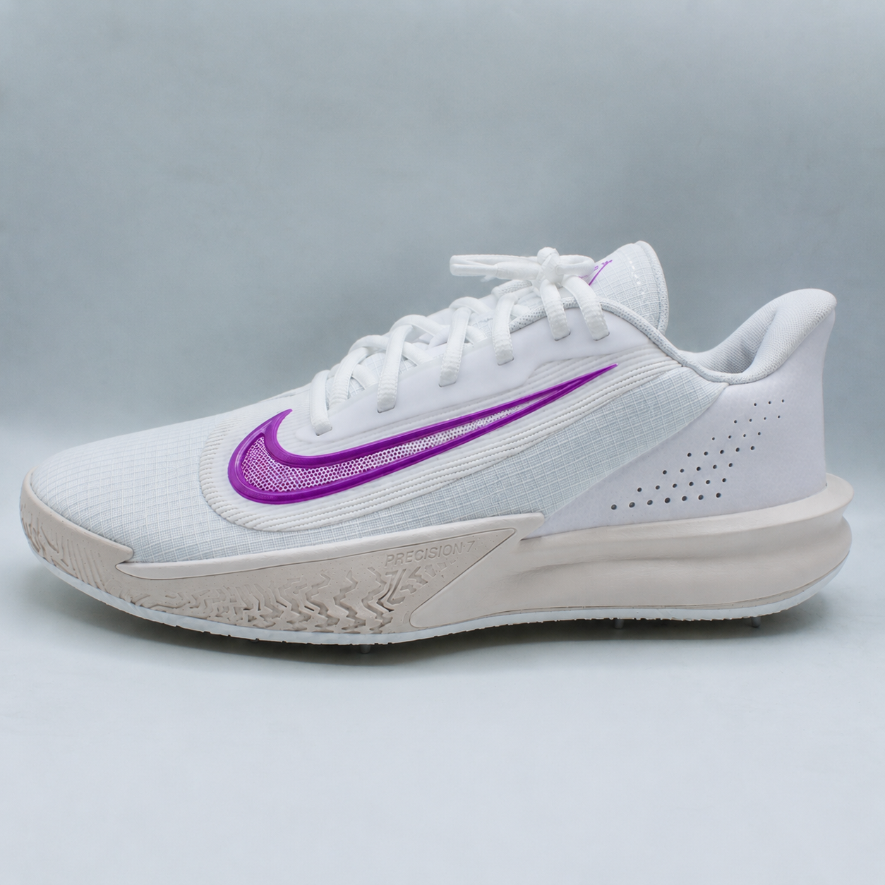 Pre-spiked Nike Precision 7
