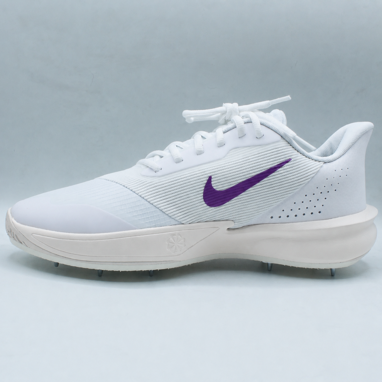 Pre-spiked Nike Precision 7